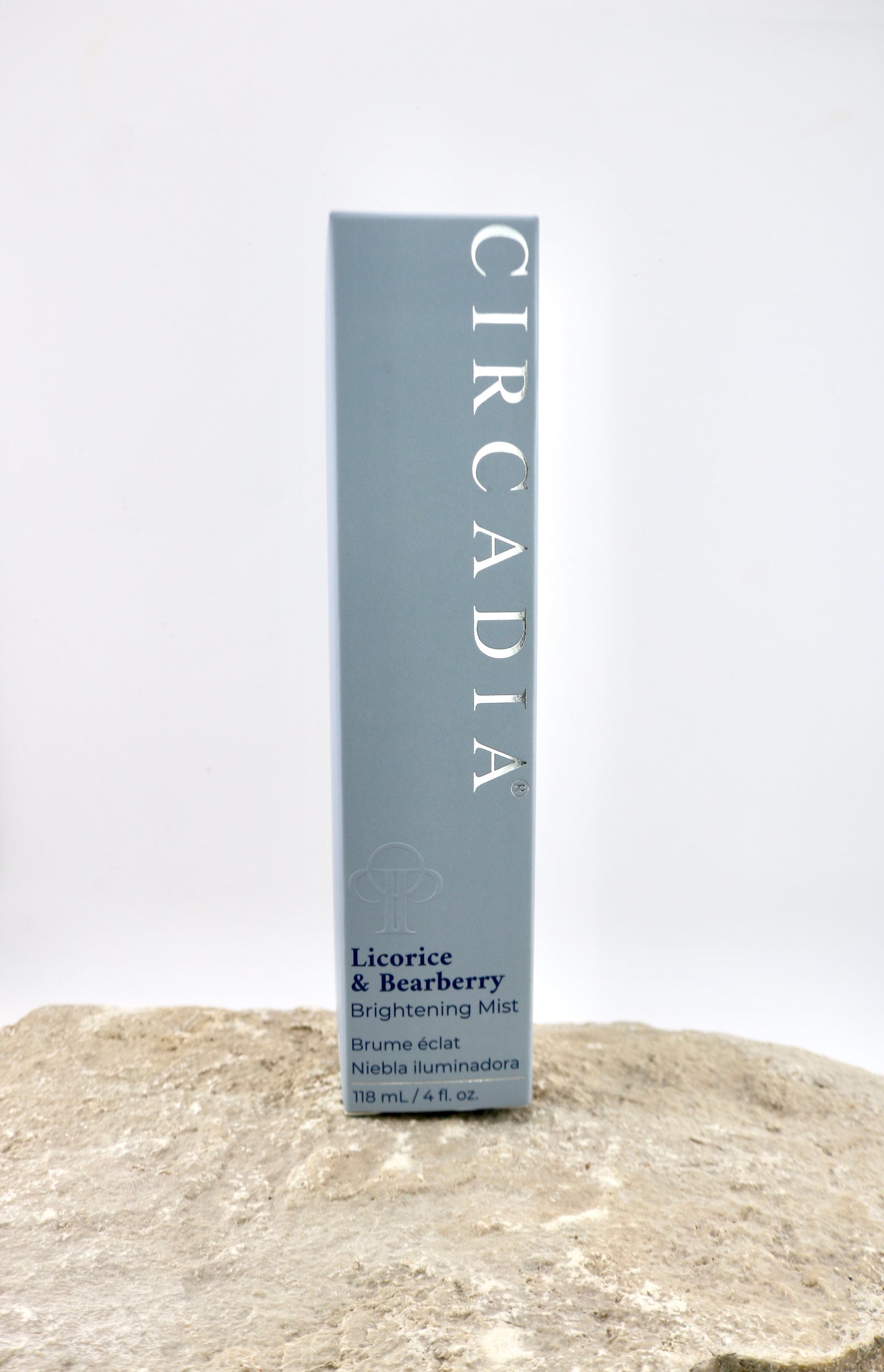 Circadia licorice and bearberry brightening mist packaging on a textured surface with a white background