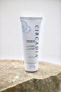 Circadia cleansing gel tube on a stone surface with a white background