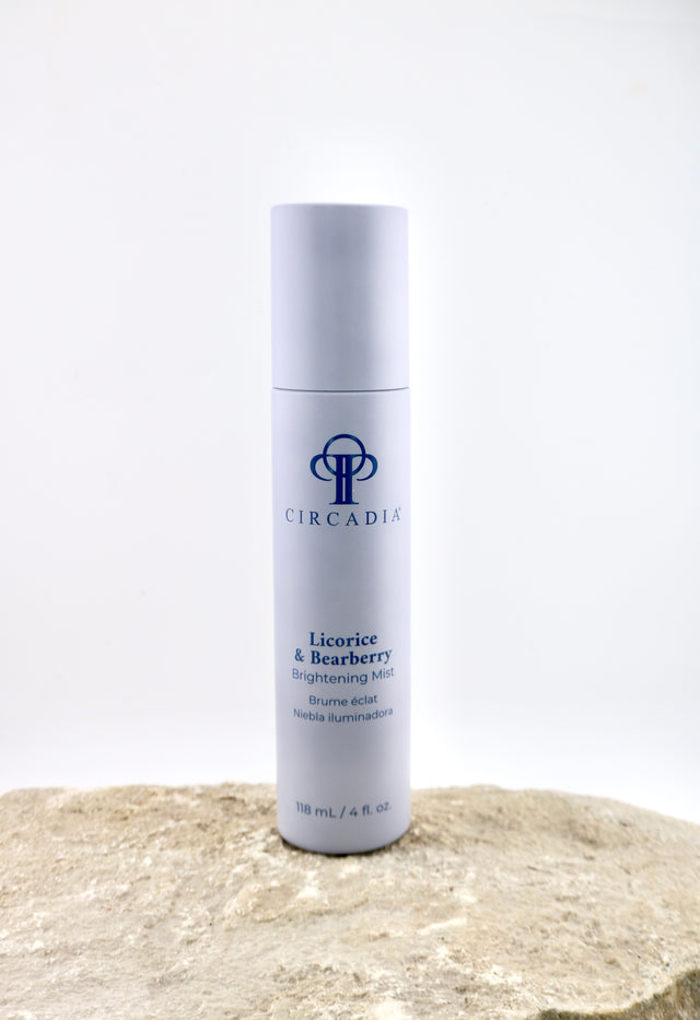 Circadian skincare bottle on a textured surface with a white background