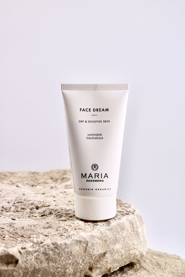 Tube of 'Face Dream' cream by Maria Åkerberg on a stone surface with a light background